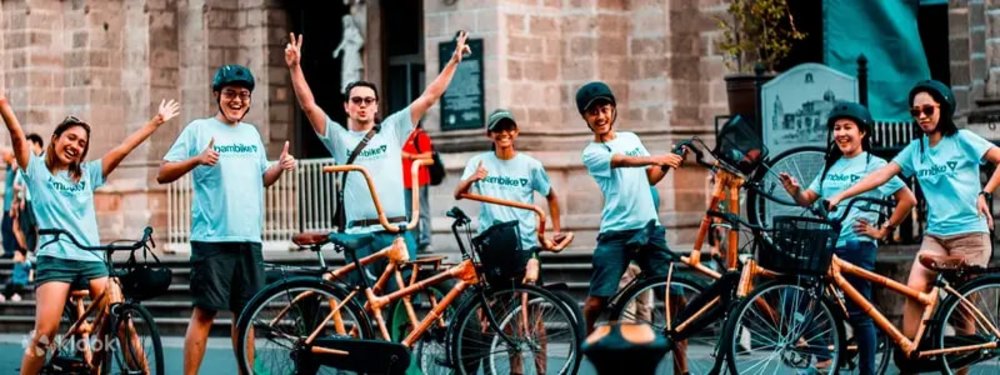 Group of tourist riding a bamboo bike