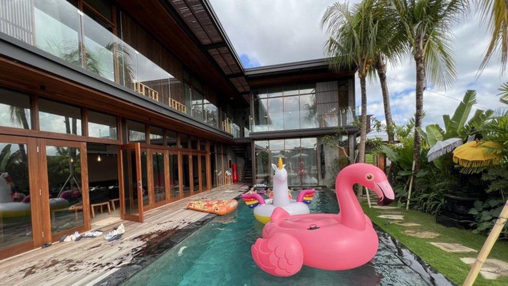 The cute pool inflatable was a delightful unicorn-shaped float, complete with colorful rainbow wings, adding a magical touch to the poolside fun. Image credit to Ryan