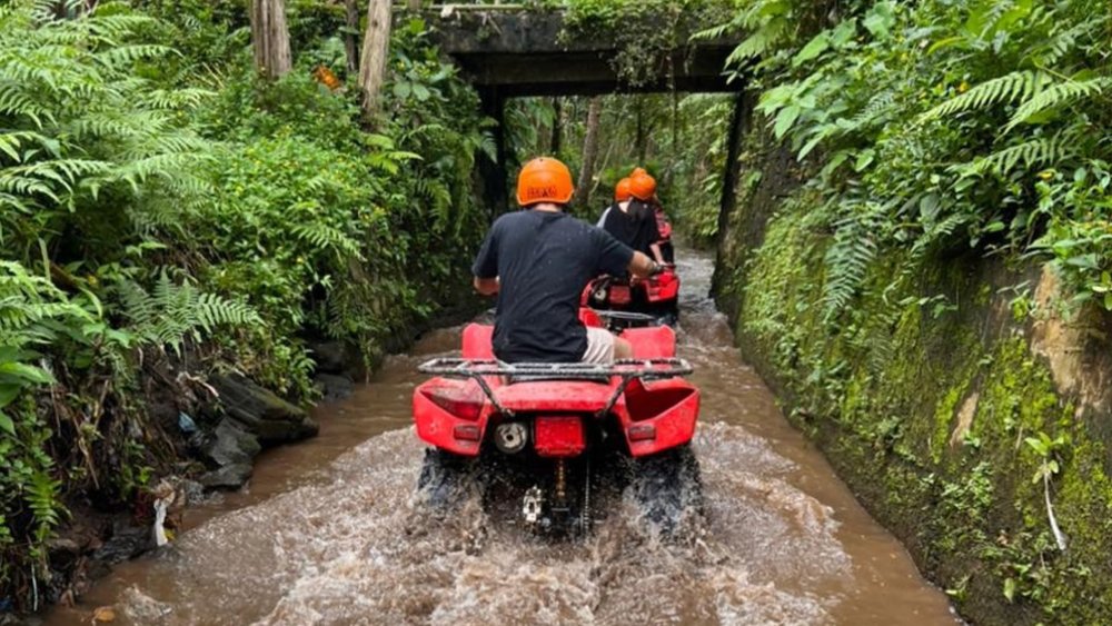 Zooming through Bali's off-road trails on an ATV provides an exhilarating and adventurous way to discover the island's hidden gems, immersing yourself in the beauty of lush jungles, rice terraces, and picturesque villages. Image credit to Ben