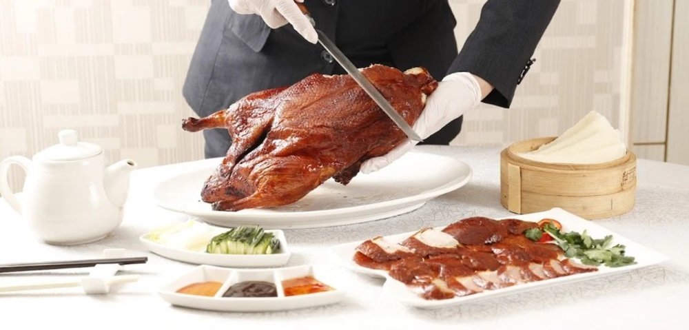 Pecking duck dish at dinner