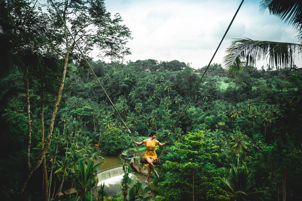 Lady in yellow on a swing