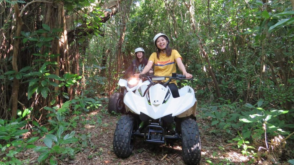 Girls riding ATV at Okinawa