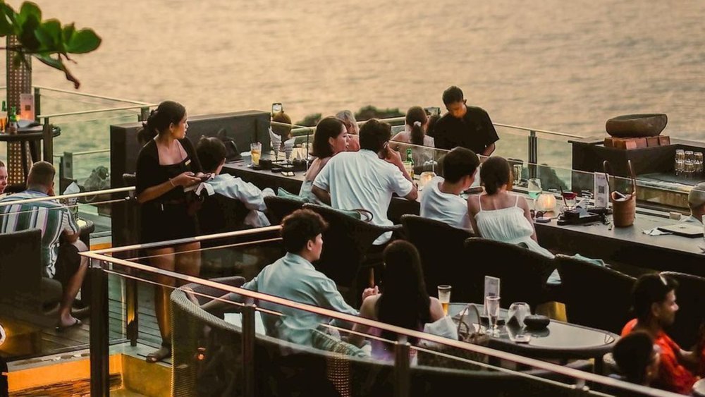 The rhythm of waves meets mixology at Rock Bar Bali. Credits: @rockbarbali on Instagram