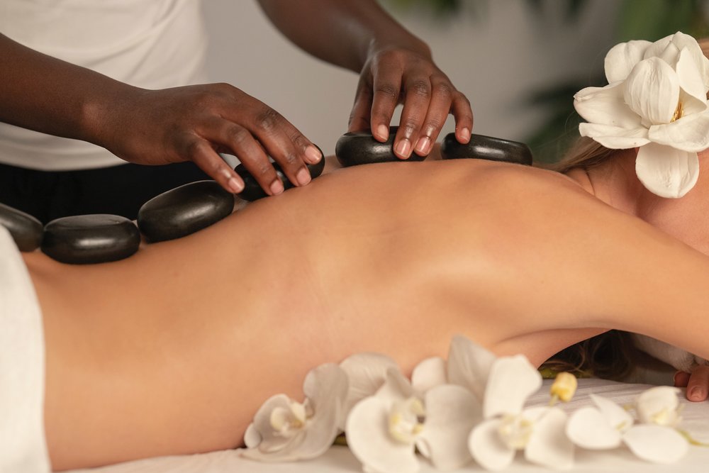 Woman getting a hot stone massage