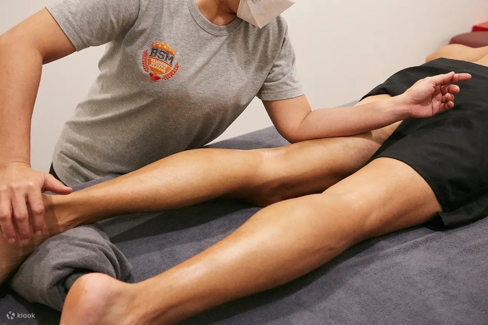 Girl massaging a leg