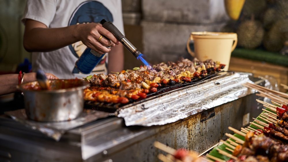 Try This Streetfood Barbecue at a Night Market in Bangkok! Credits: Norbert Braun on Unsplash