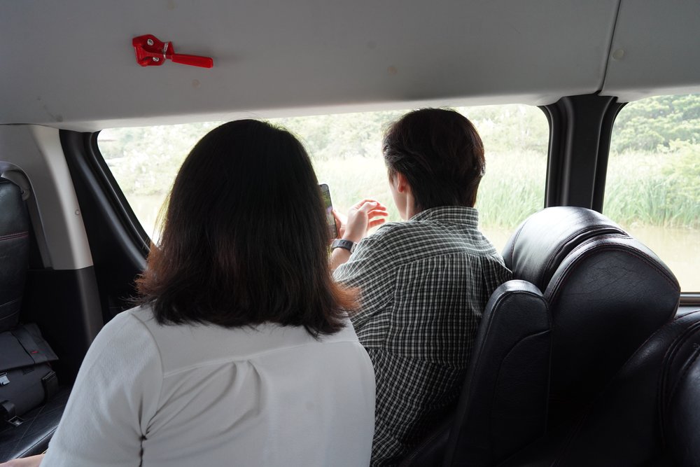 Man and woman inside a car