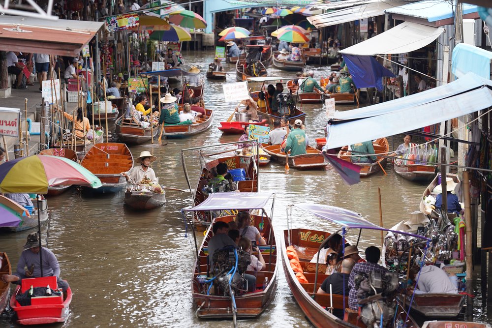 Many boats with people in the river