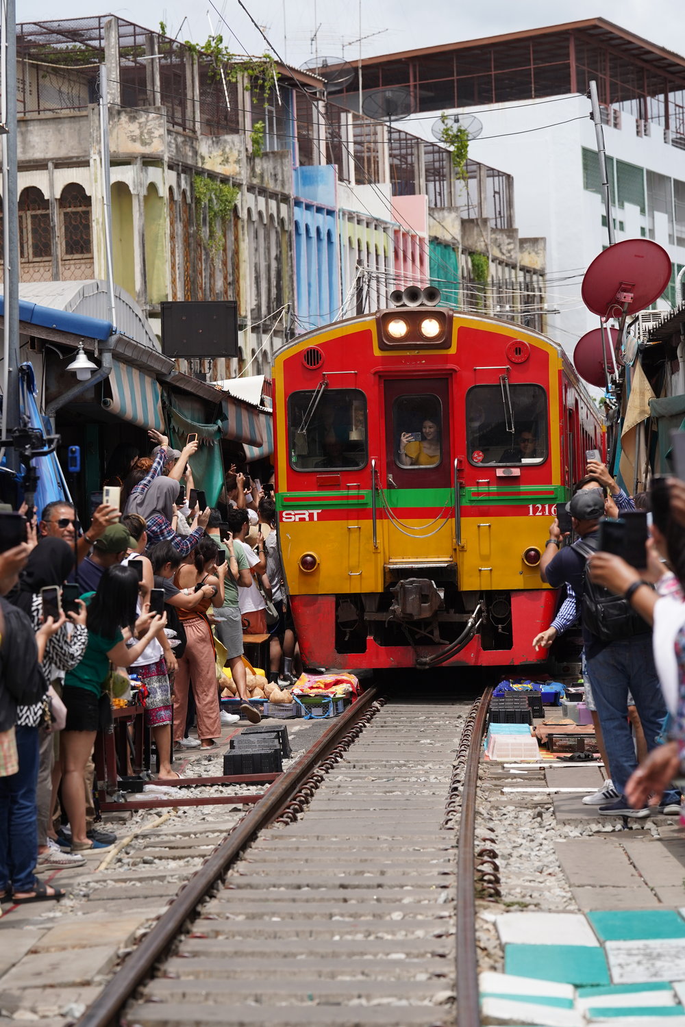 People watching the train pass by