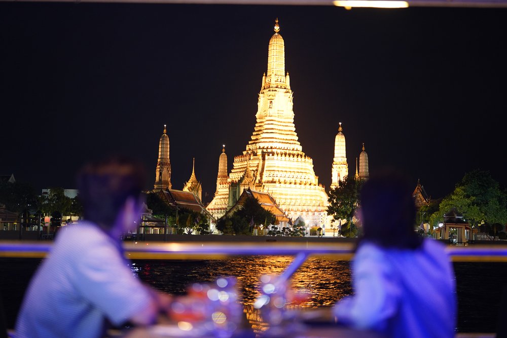 Man and woman looking at a temple