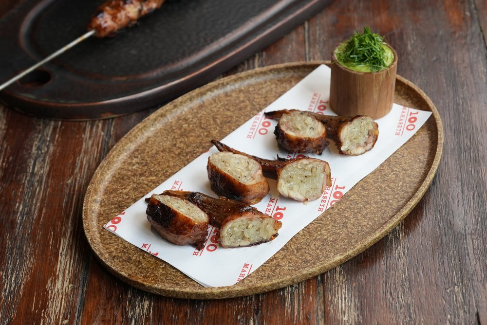 Rice stuffed chicken wings on a plate