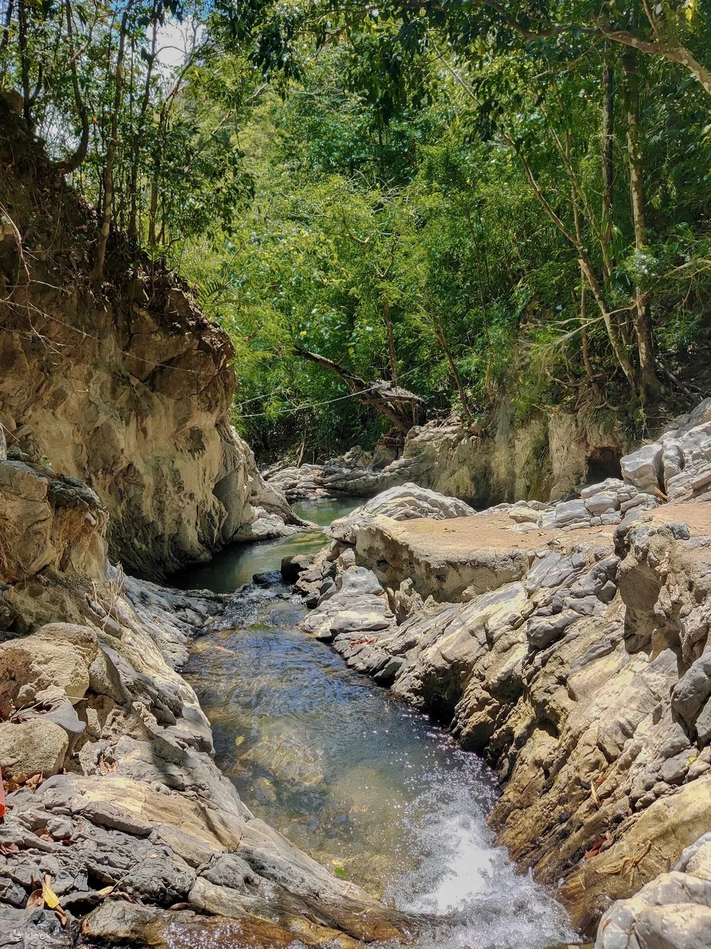 River surrounded by white stone