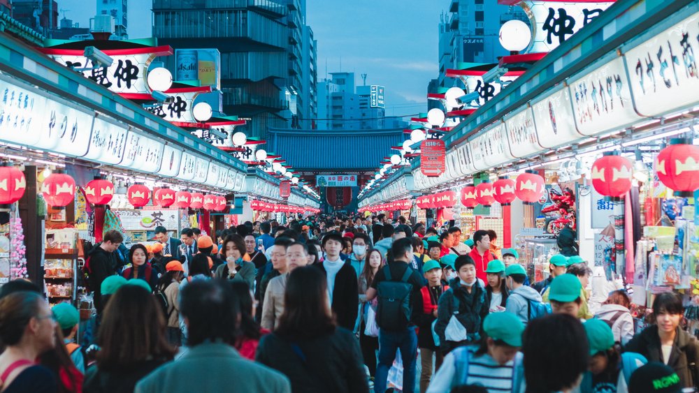 Roam the bustling night markets of Tokyo! Credits to Benjamin Wong on Unsplash