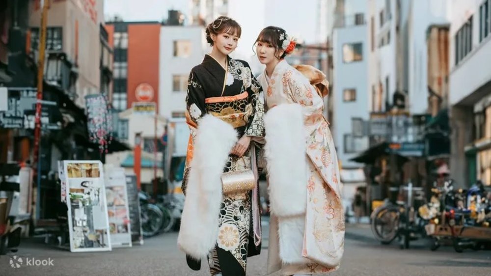 Girls wearing a beautiful Kimono