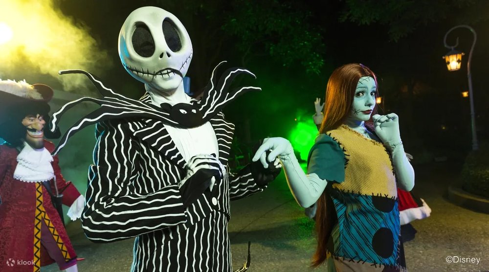 Disney characters in halloween themed costumes