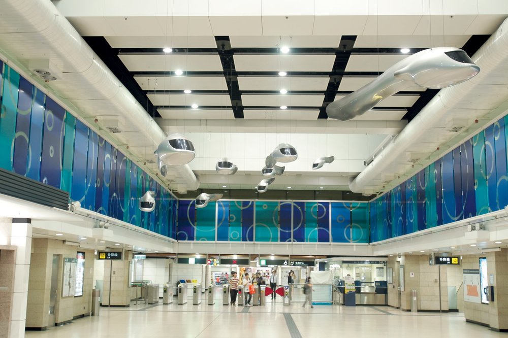 tad pole design inside Mong Kok Station Facade