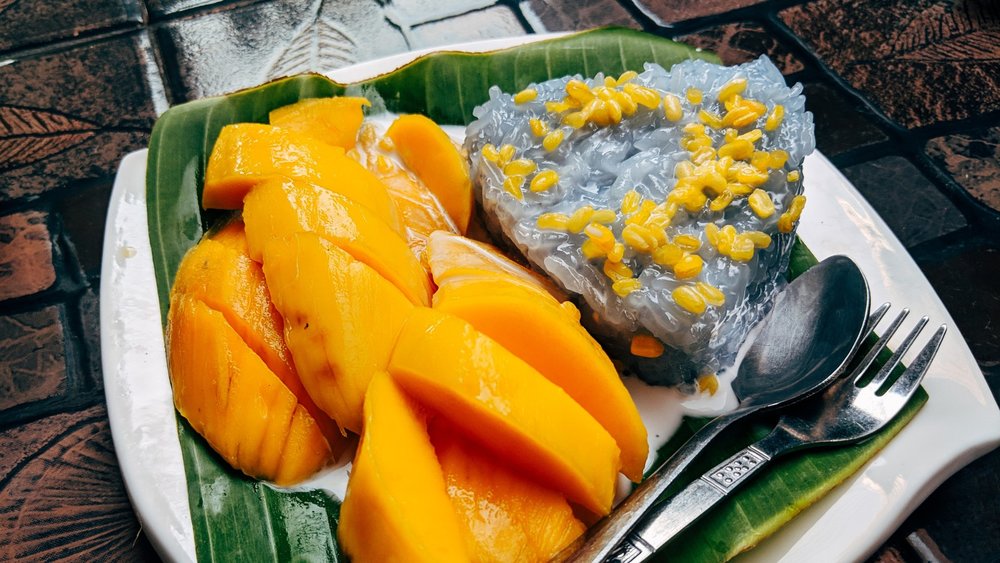 Make sure to try the world-famous mango sticky rice. Credits to Markus Winkler on Unsplash