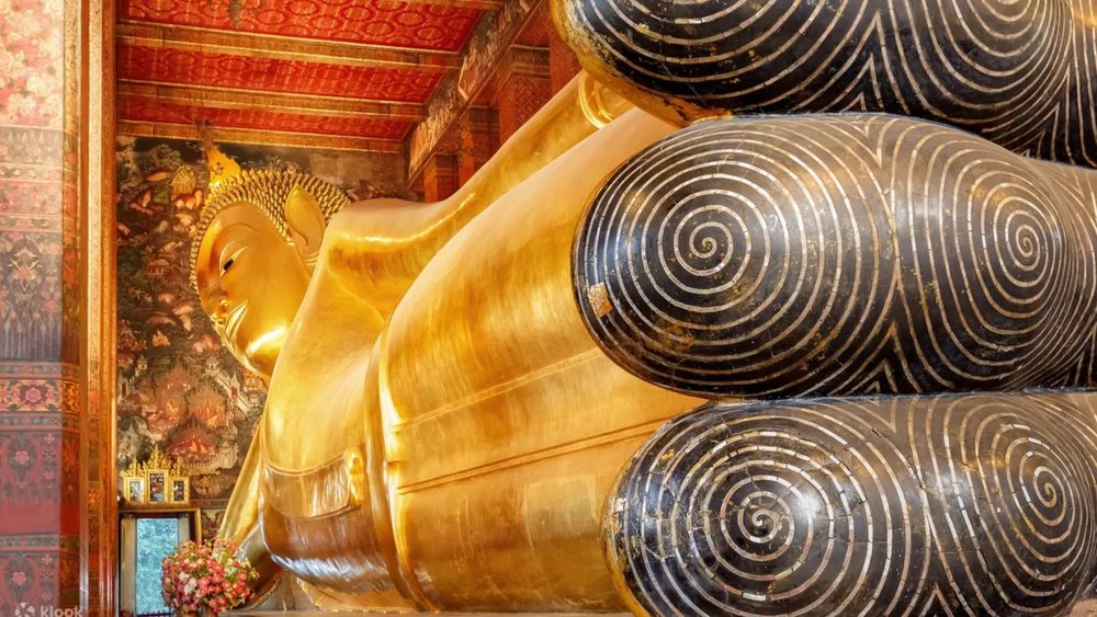 See Wat Pho's impressive 46-metre-long reclining golden Buddha! Credits: Klook