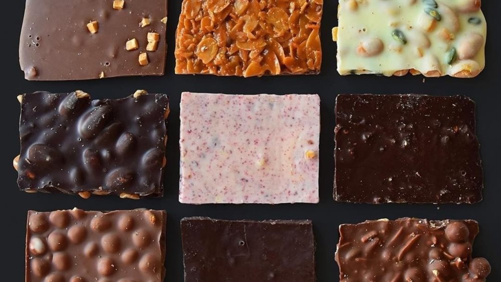 Look at the variety of chocolates made in Switzerland. Image credits to @laderach_na on Instagram