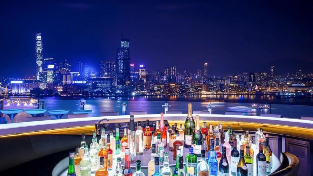 Watch the illuminated sky from the bar. Image credit to SKYE Rooftop & Dining on Facebook