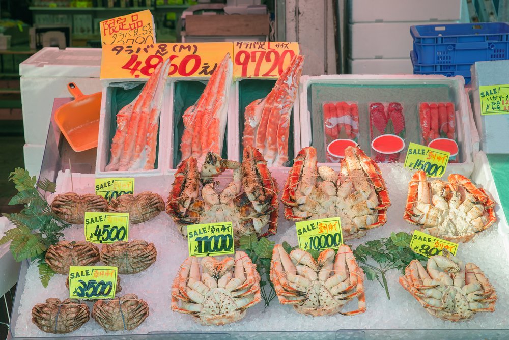 crabs and other shellfish at a market in sapporo