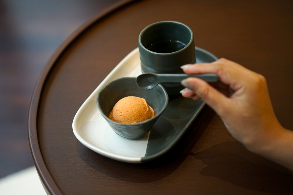 gelato served in a tray with drink