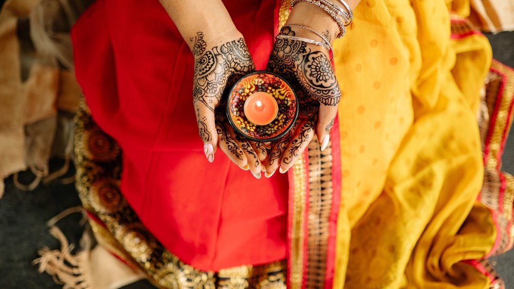 person-carrying-a-lighted-candle