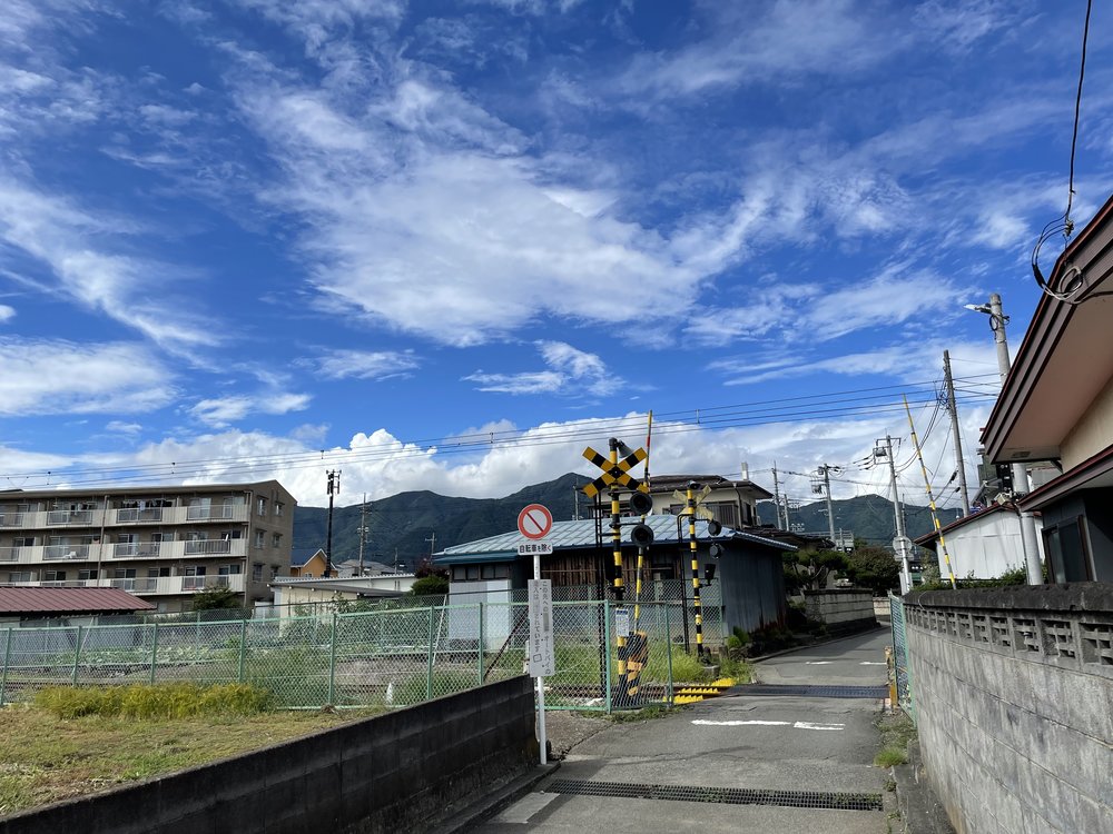 blue skies over narrow streets