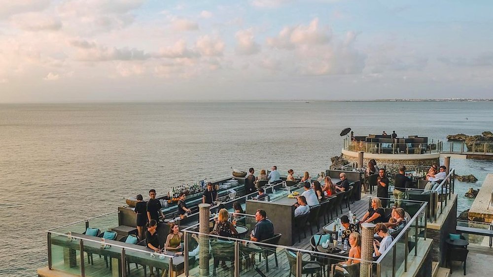 Take your date from day to night as you soak up the sunset. Credits to @rockbarbali on Instagram