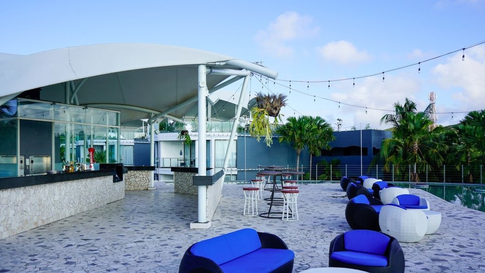 Nothing beats relaxing with an ice-cold beer and a rooftop sunset view. Credits to @lemeridienbali on Instagram