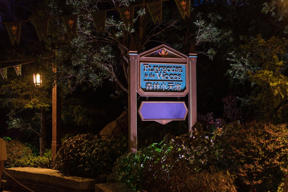 Playhouse in the woods signage