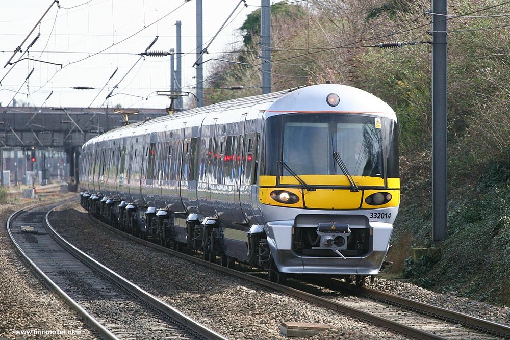 a heathrow express train traveling between heathrow airport and london