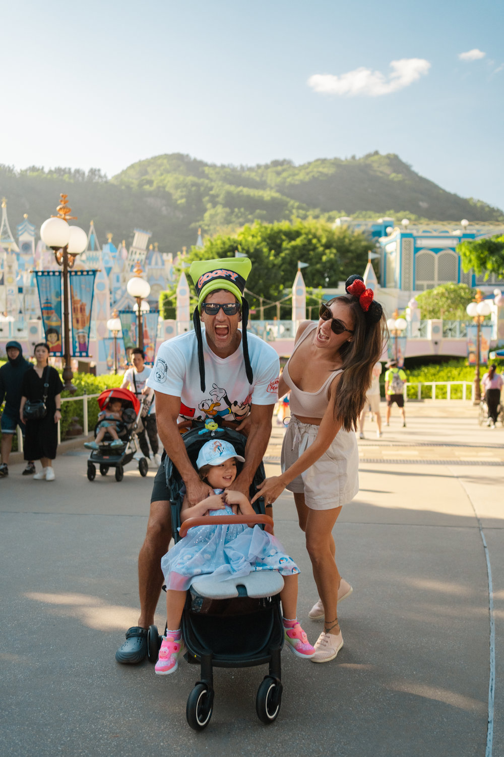 bolzico family strolling in hong kong disneyland