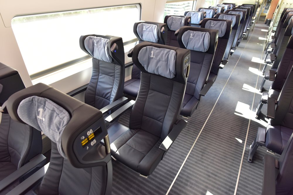 Black seats inside a train