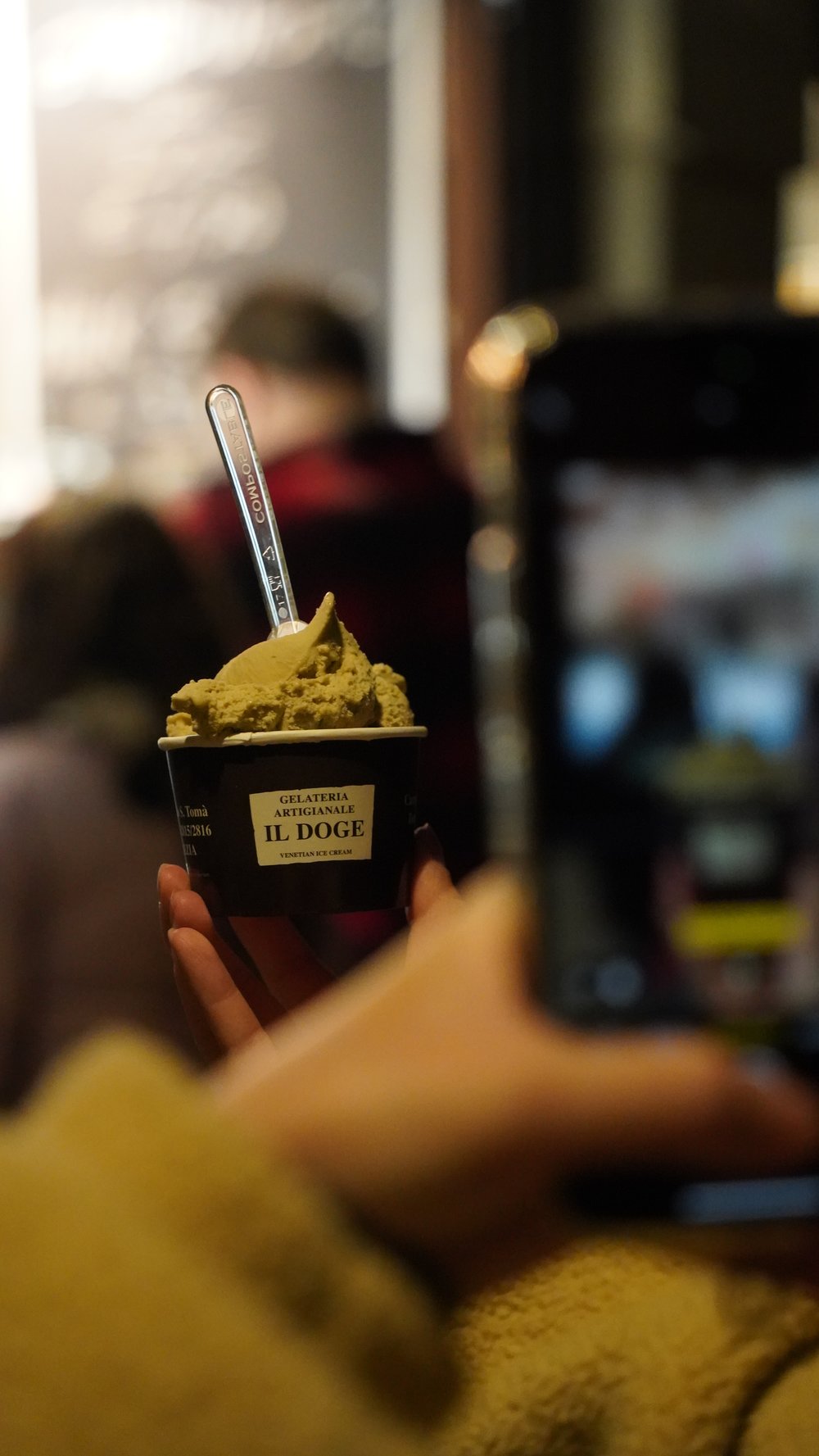 Person holding gelato