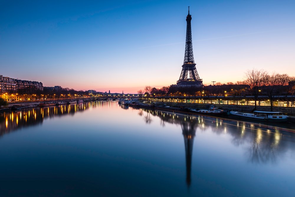 paris view of the river seine and eiffel tower at night