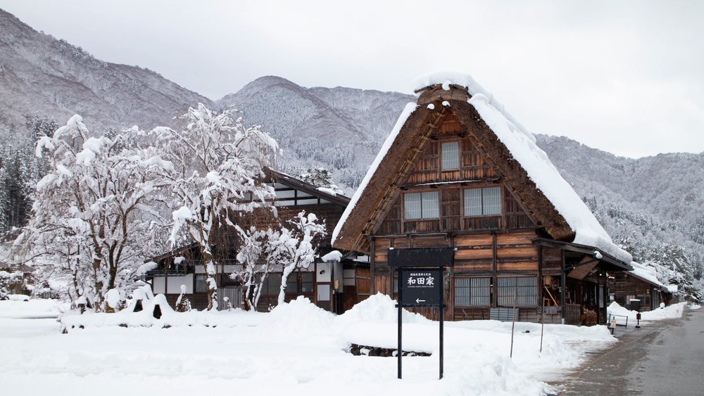 snow-covered gassho-zukuri style house