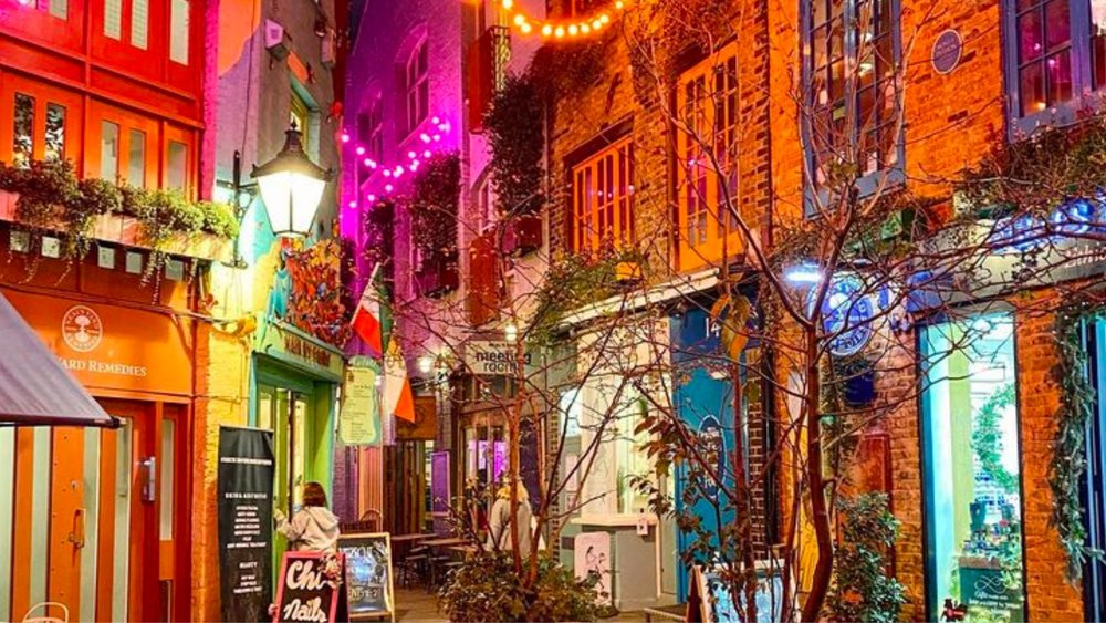 The colours of the rainbow spill over Neal's Yard enhanced by Christmas lights! Credits to @aleks_london_diary on Instagram