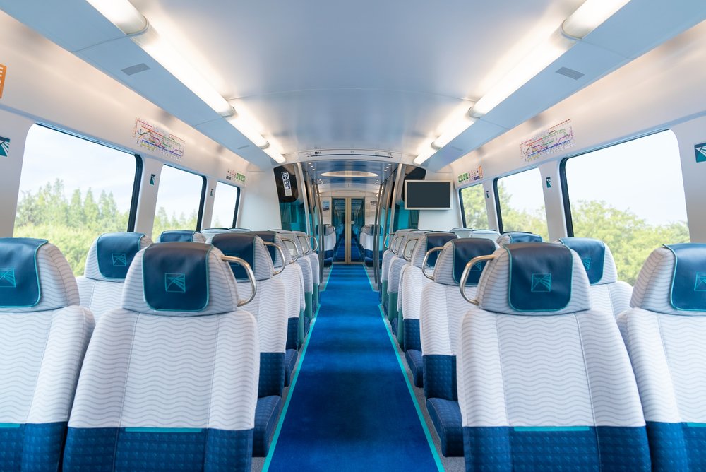 Blue and white seats in a train