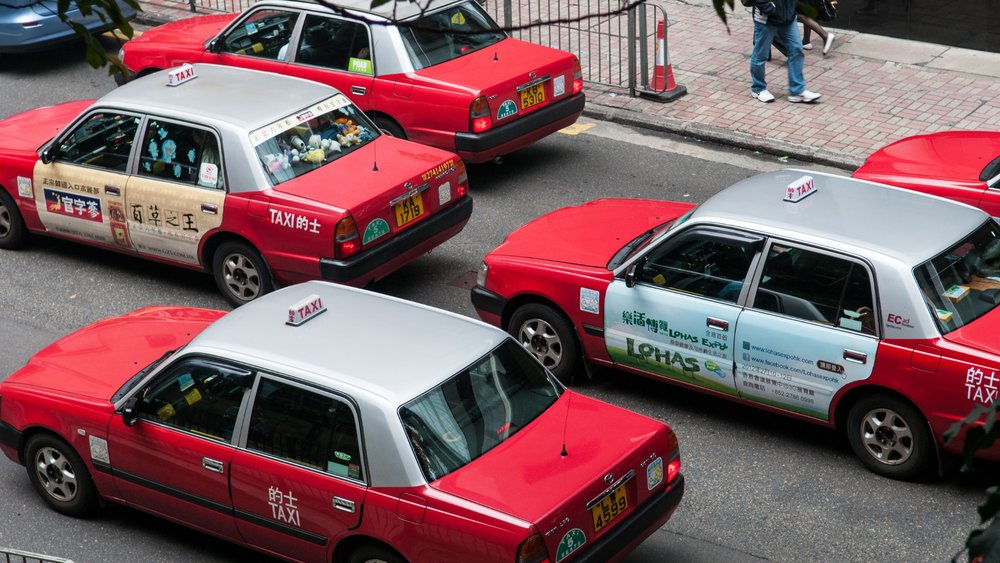 Red taxis on the road