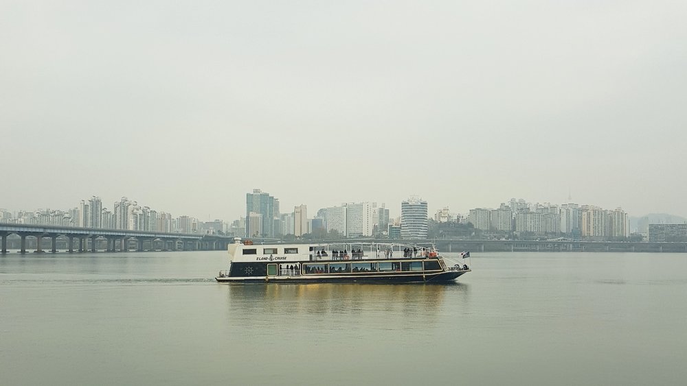 Sail through the Hangang River and savour majestic views of the city! Credits to Geonhui Lee on Unsplash