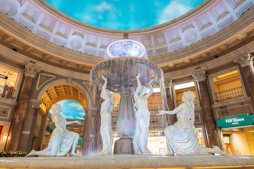 an elaborate indoor fountain inside the Venus Fort Mall