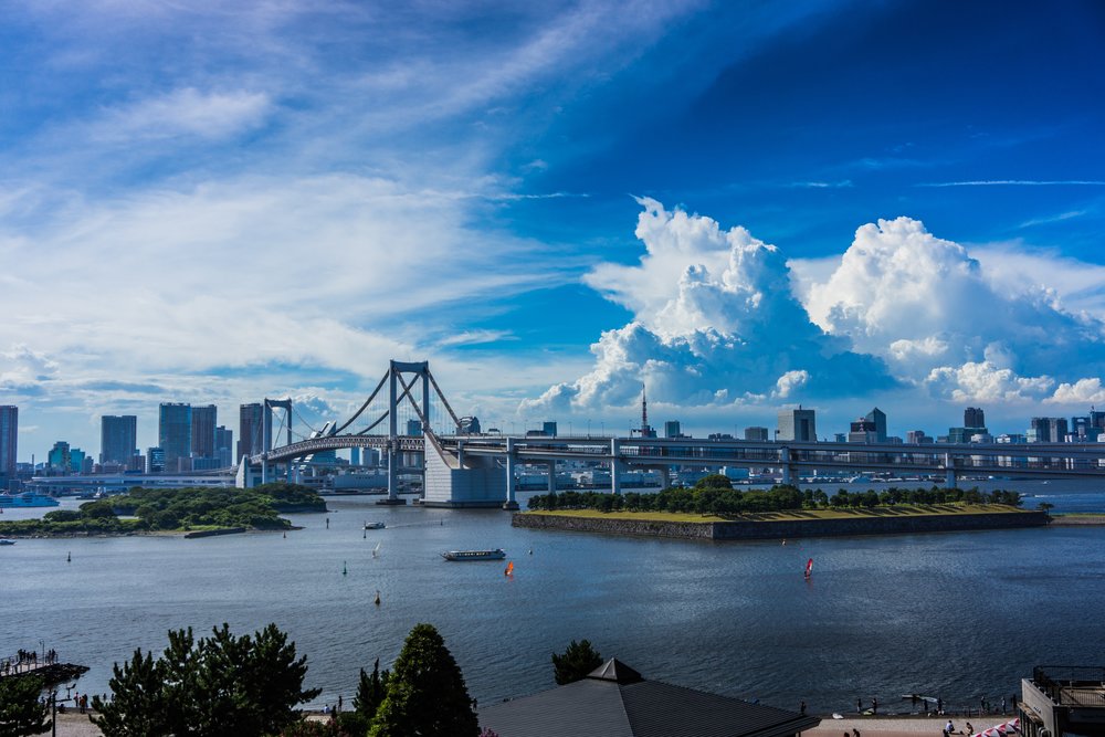 a clear view of Odaiba's Rainbow Bridge during the day
