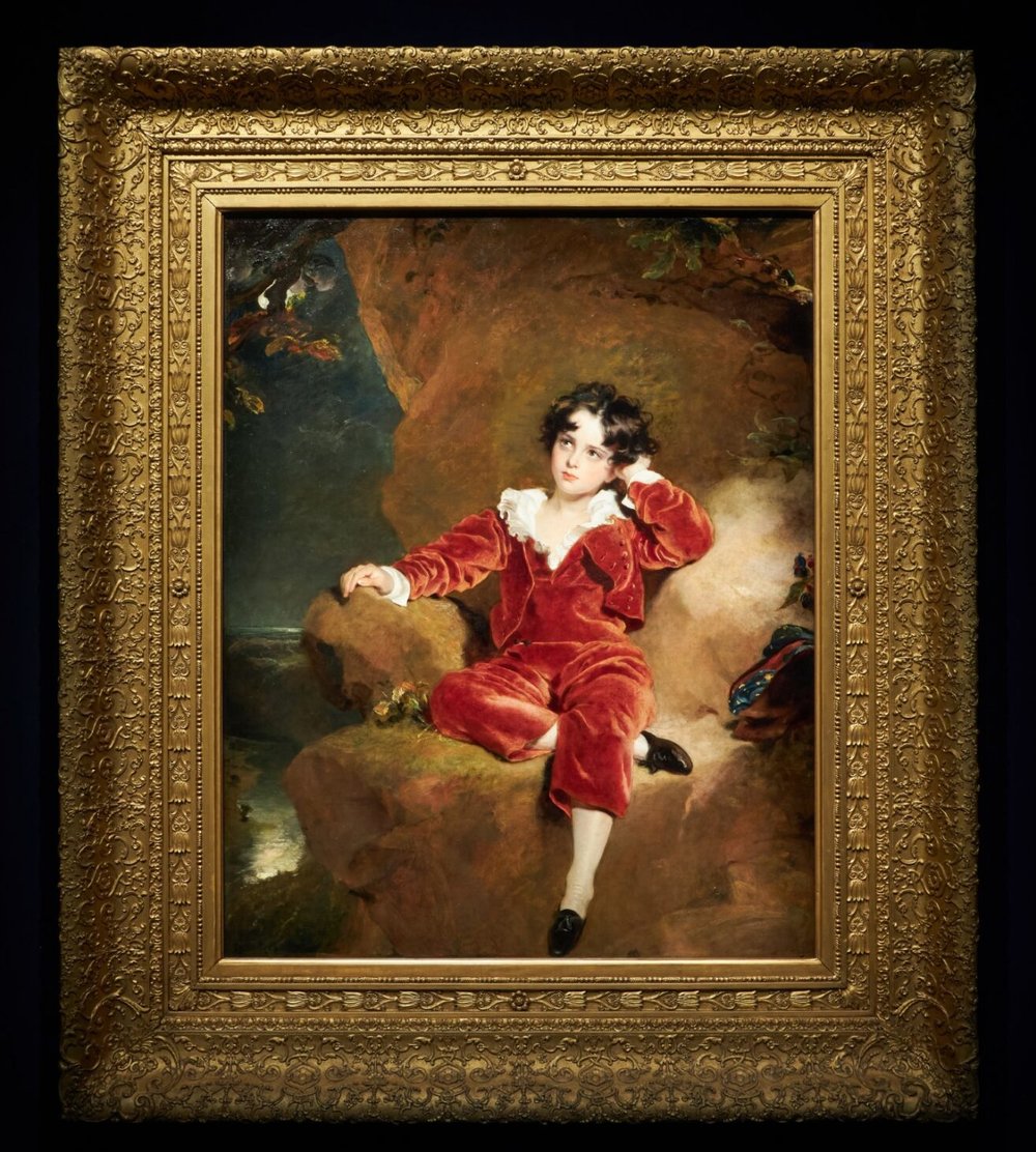 Portrait of a boy in red