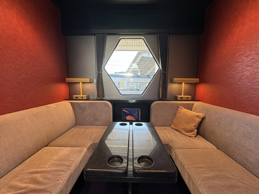 sofas inside the compartment of spacia x train