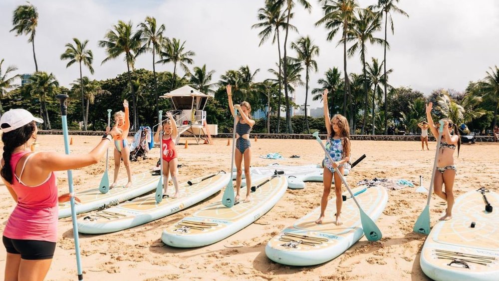 Be sure to try all the fun water activities, like paddle boarding! Credits to @islandpaddlebliss_hawaii on Instagram