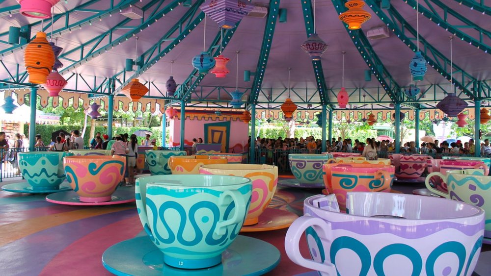 Go round and round as fast as you can on these colourful tea cups!  Credits to @lorenjavier on Flickr