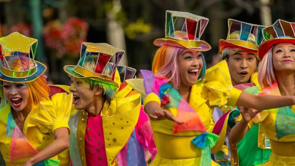 Dance along to Disney songs at the Disney Harmony in Color parade!
