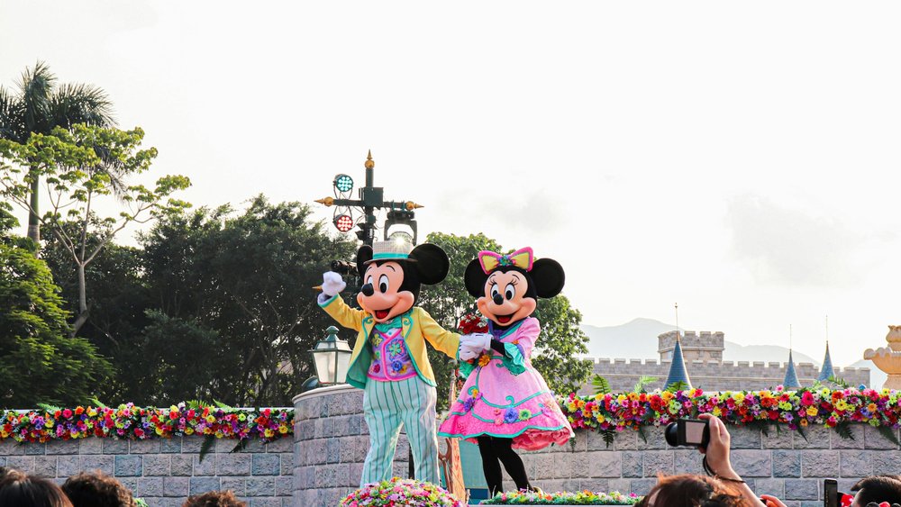 Step onto Main Street and be greeted by your favourite couple, Mickey and Minnie! Credits: @megglandrito on Unsplash