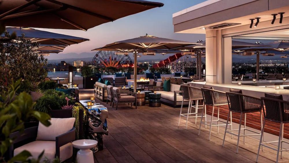 Admire the sunset view when you head up to the rooftop lounge area. Credits to Klook
